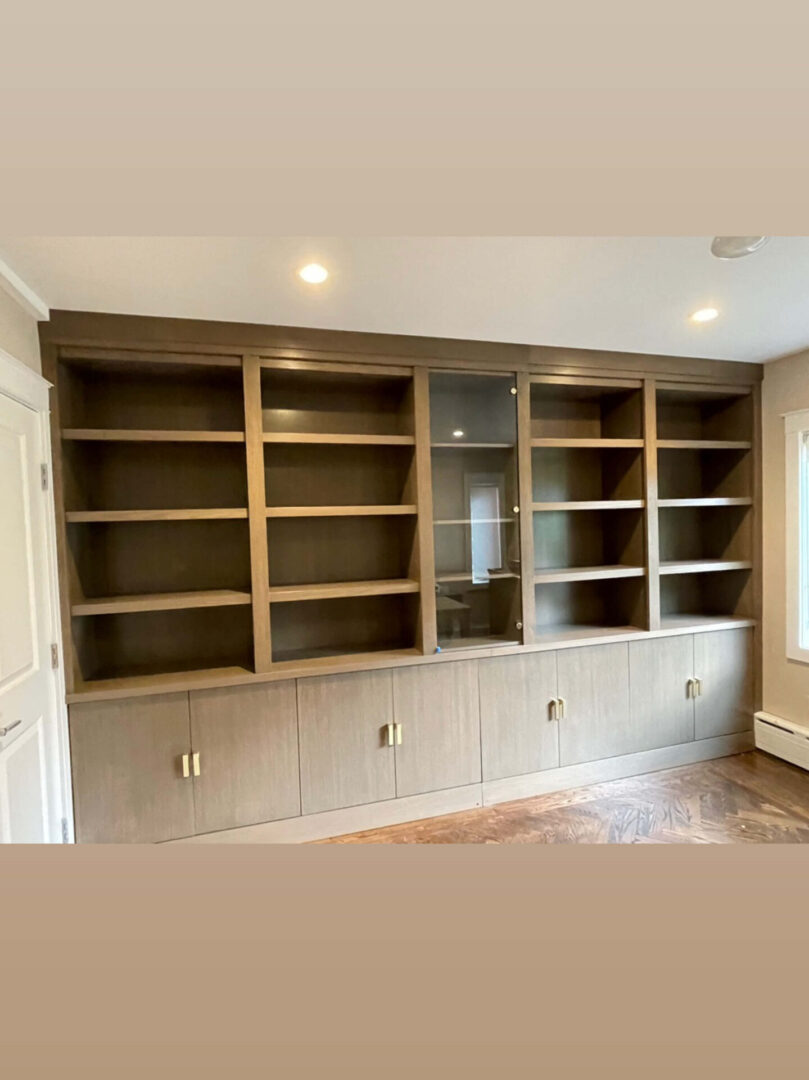 A room with many shelves and cabinets in it