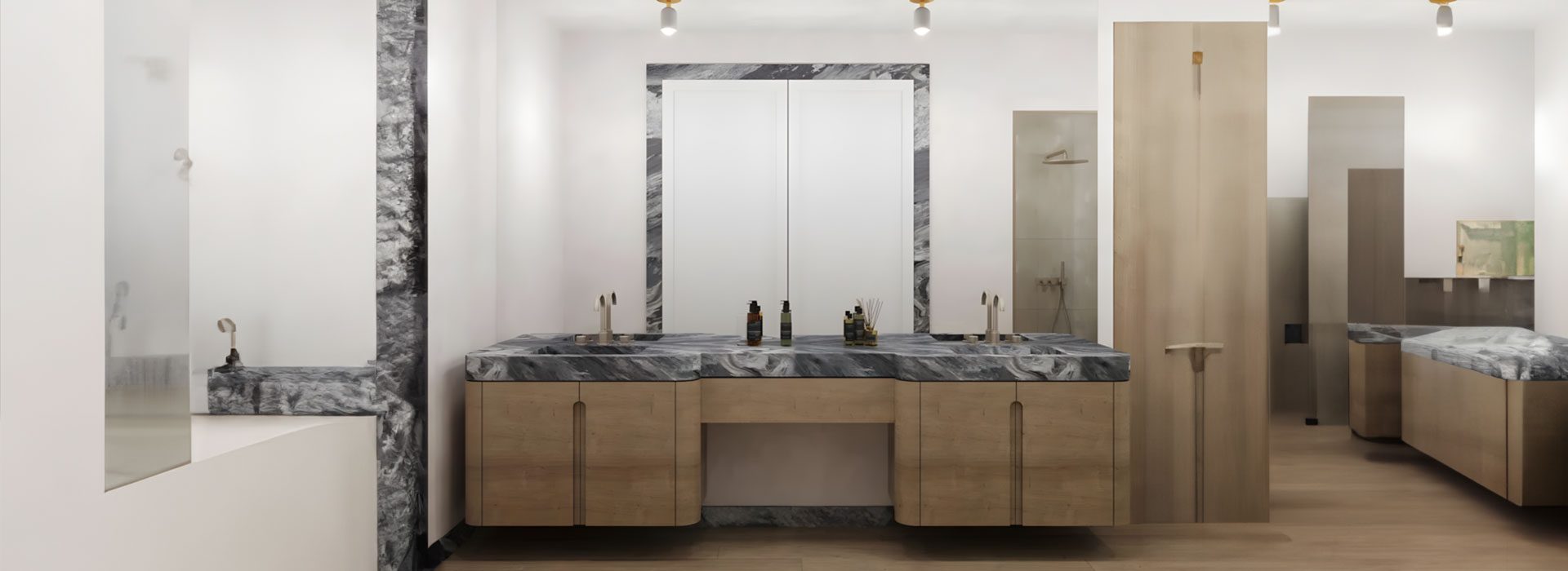 A bathroom with two sinks and a large mirror.